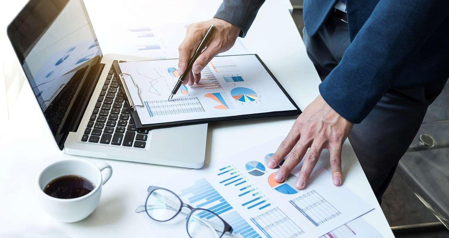 Midsection Of Businessman Working At Office