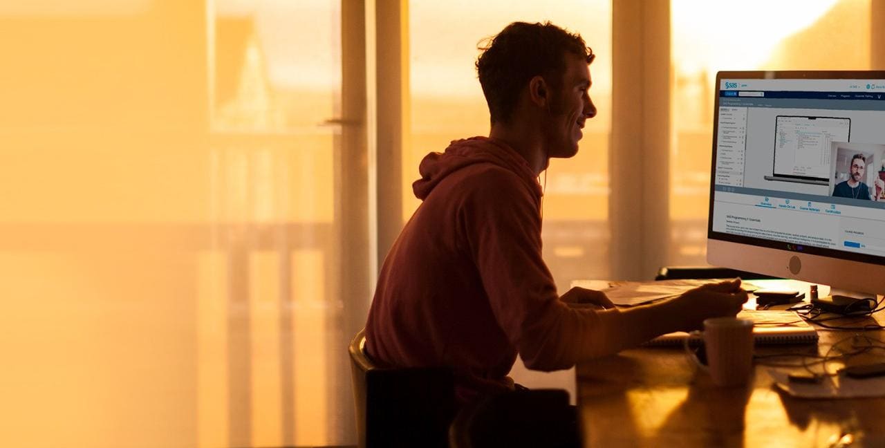Male student taking an online class at learn.sas.com