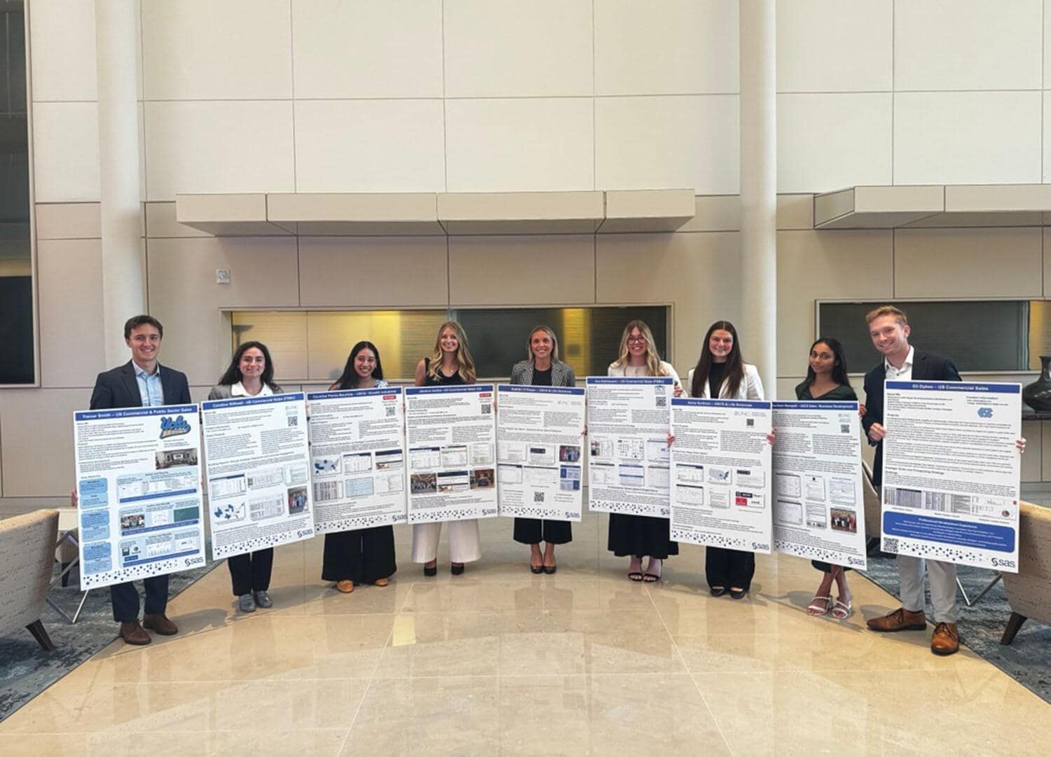 Annual Intern Expo Group of interns holding their posters at Intern Expo